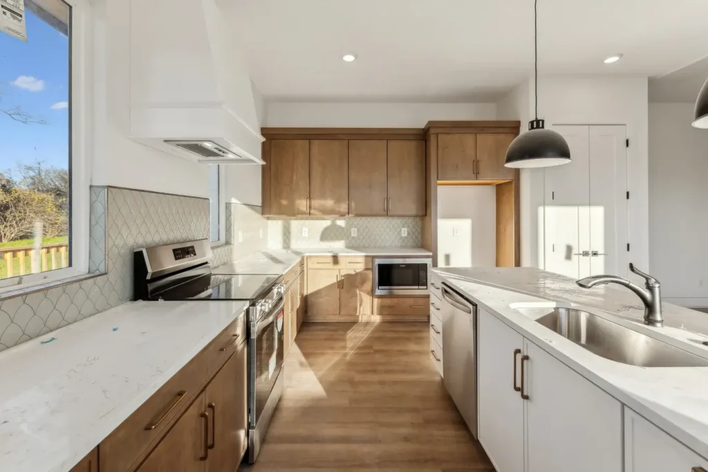A beautiful indoor view of a new kitchen home renovation
