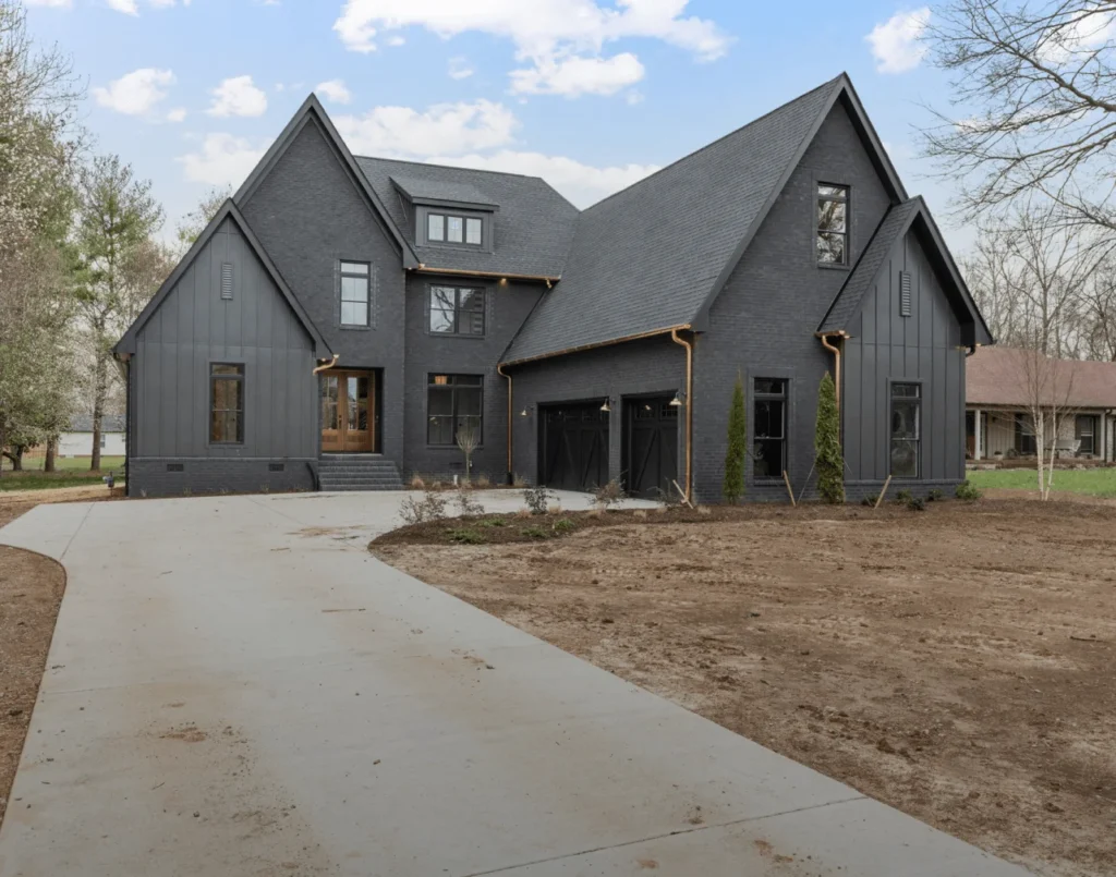 A picture of a new custom home build on a plot of land